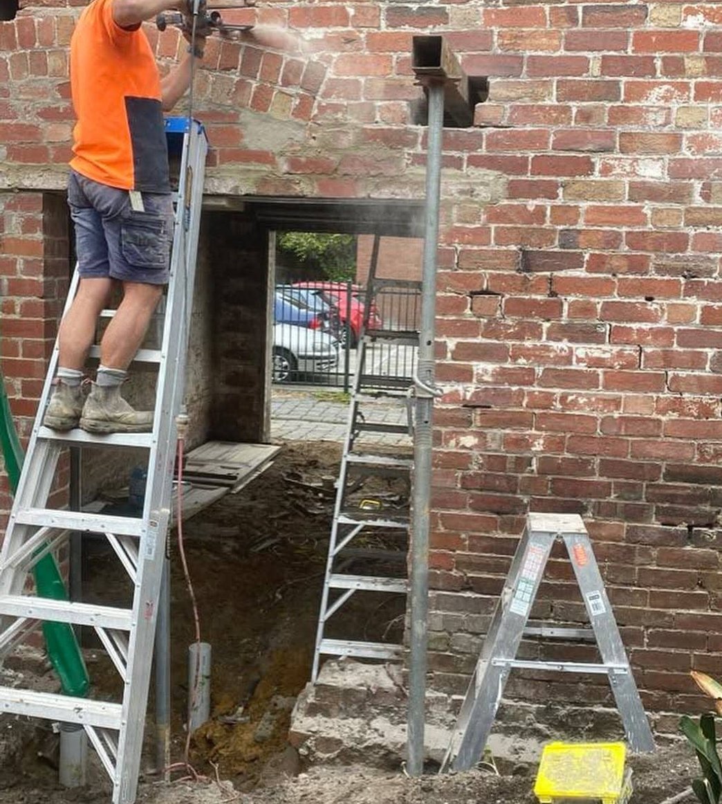 Peter and Zak on a bricklaying site