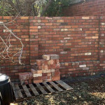 High used brick fence with carefully selected brick placement by Alternative Bricklaying High used brick fence with carefully selected brick placement
