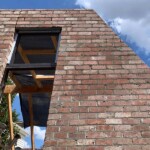 High used red brick wall with angle by Alternative Bricklaying High used red brick wall with angle