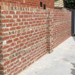 Second hand red brick fence by Alternative Bricklaying Second hand red brick fence